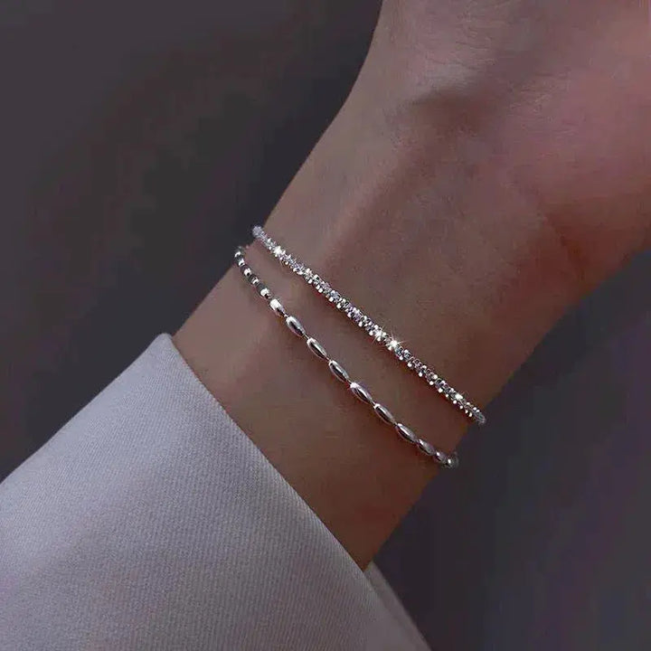 Elegancki zestaw bransoletek ze srebra z kamieniami cyrkoniowymi